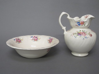 A floral patterned jug and bowl set