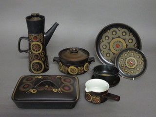 A 46 piece Denby Arabesque pattern dinner service comprising rectangular vegetable dish 11", rectangular bowl 14", 2 circular  tureens and covers 7", sauce boat 4", 6 soup bowls 5 1/2", 6  dinner plates 10", 7 tea plates 6 1/2", 6 cups and 6 saucers - 1f,  coffee pot 12", 6 coffee mugs, 2 cream jugs and a lidded sugar  bowl