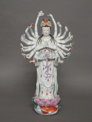 A large pottery figure of multi handed Goddess 22"