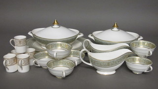 A 14 piece English Renaissance pattern dinner service with 2 oval  meat plates 16" and 13 1/2", pair of oval twin handled tureens  and covers 12" - 1 with slight crack, 2 sauce boats, 8 twin  handled soup bowls together with 6 Royal Doulton Sovereign  coffee cans