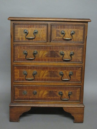 A Georgian style mahogany chest with crossbanded top, fitted 2  short and 3 long drawers, raised on bracket feet 18"