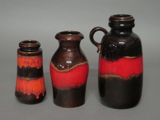 A West German brown and red glazed pottery jug, the base  marked 413-26 10", a Scheurich-Keramik club shaped vase, base marked 208-21 8" and 1 other the base marked 209-18 8"