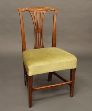 A Georgian country oak Hepplewhite style dining chair with  upholstered seat, raised on square tapering supports