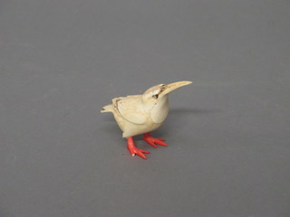 A carved ivory figure of a bird 3", claw f,