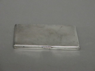 An Art Deco silver cigarette case with engine turned decoration London 1937 by the Goldsmiths & Silversmiths Co. 5 1/2 ozs