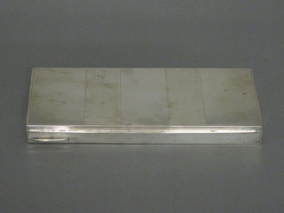 A rectangular Art Deco Continental white metal cigarette box  with hinged lid