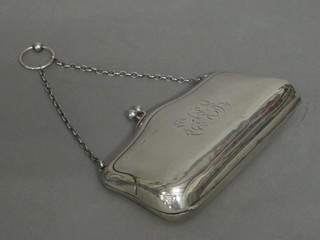 A silver purse with engraved decoration, marks rubbed,
