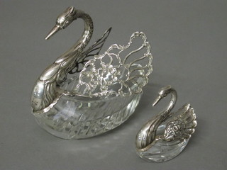 2 German cut glass salts in the form of swans with silver mounts  4" and 2"