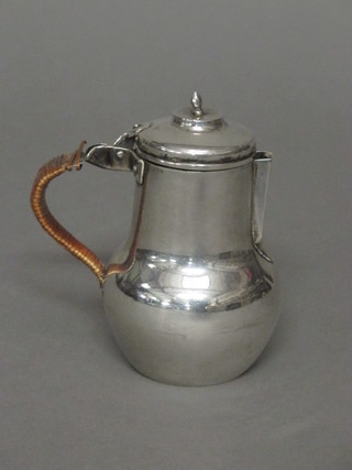 A silver hot milk jug of baluster form, Birmingham 1911, 3 ozs