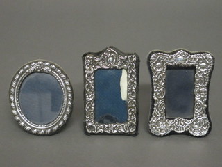 A modern oval silver easel photograph frame 2" and 2 other  modern silver photograph frames 4"
