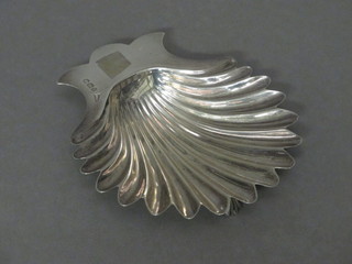 A Victorian silver scallop shaped butter dish Sheffield 1898 by Walker & Hall, 2 ozs