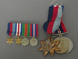 A group of 4 medals comprising 1939-45 Star, France and  Germany Star, Defence and War medal together with a group of  miniatures