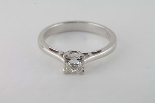 A lady's white gold solitaire dress ring set a diamond, approx 0.58ct