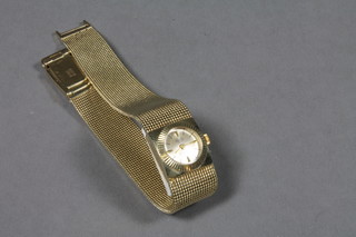 A lady's Berger wristwatch contained in a 14ct gold case with integral bracelet