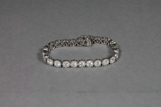 A lady's 18ct white gold bracelet set circular cut diamonds,  approx 13.35cts