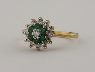 A 9ct gold emerald and diamond dress ring