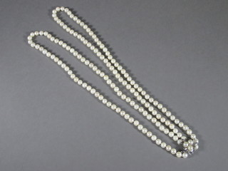 A double row of cultured pearls with gold clasp
