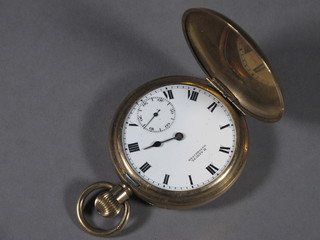 An H Samuel of Manchester pocket watch contained in a gold plated full hunter case