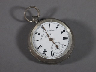 A open faced pocket watch by Samuels contained in a silver open case