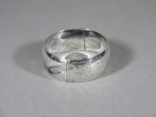 An engraved Sterling bangle