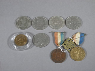 A 1964 Tokyo bronze commemorative medallion together with a collection of coins