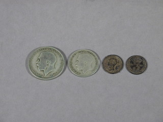 An 1878 silver thruppence and an 1899 silver ditto, a George V florin 1920 and a George V shilling 1920