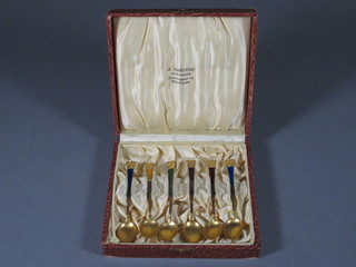 A set of 6 Continent gilt metal and enamelled coffee spoons
