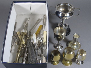 A silver plated twin handled trophy and a small collection of flatware etc