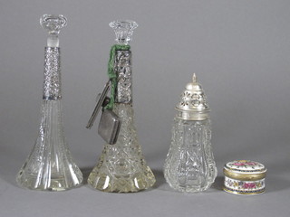 2 glass scent bottles with silver collars, a glass sugar caster with silver cover, a vesta case and a folding pocket knife