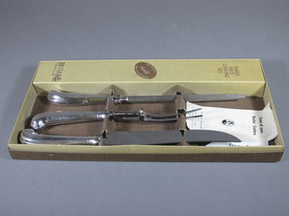 A Butler 3 piece carving set with pistol grip