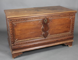 A 19th Century Continental pine coffer with hinged lid the base fitted a drawer, raised on bracket feet 59"