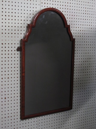 A Queen Anne style arched plate mirror contained in a walnut frame 15"