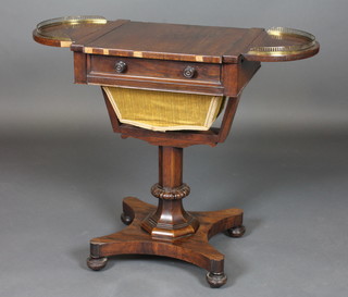 A handsome Regency rosewood drop flap games/work table, the lid inlaid a chessboard, the interior inlaid a cribbage board, the  drop flaps with brass three-quarter gallery, raised on a chamfered  column with triform base 19"  ILLUSTRATED  FRONT COVER