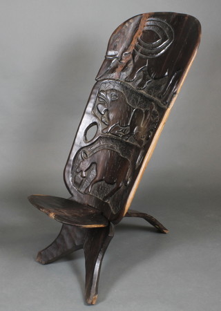 A carved Eastern chair