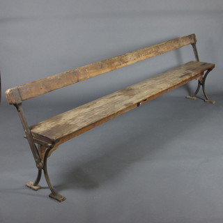 A pair of Victorian cast iron and pine railway/ships benches 102"