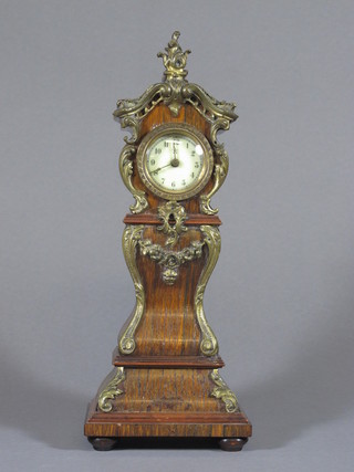 A Continental miniature longcase clock with porcelain dial and Arabic numerals contained in a "rosewood" and gilt mounted  case 13"  ILLUSTRATED