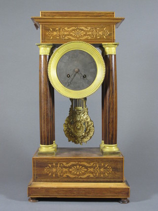 A 19th Century French Portico clock with silvered dial and  Roman numerals contained in an inlaid rosewood case supported  by 4 pillars, bell missing,  ILLUSTRATED