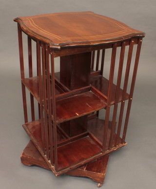A shaped inlaid mahogany 2 tier revolving bookcase 21"