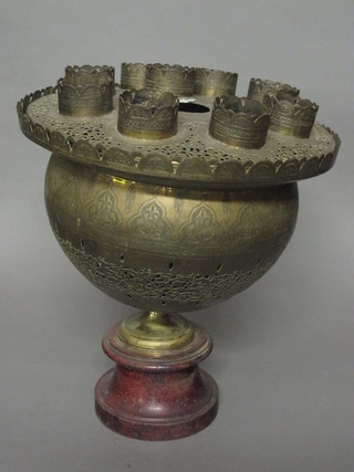 A circular pierced brass mosque lamp converted for use as a vase  16"
