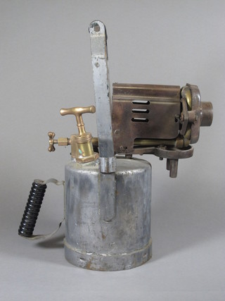 A large military issue blow lamp marked S H & S B 1943