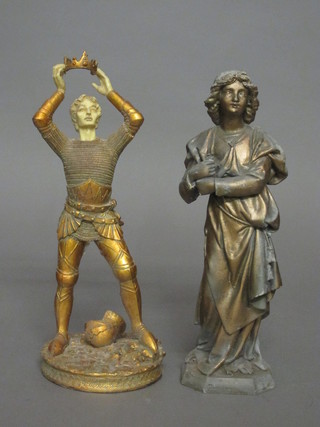 A plaster figure of a standing Joan of Arc? 11" and a resin  figure of King Arthur?