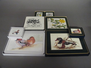 4 various sets of place mats, boxed, together with 3 sets of coasters, boxed