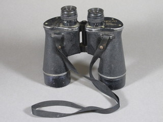 A pair of American naval binoculars marked Anchor Optical  Corporation US Navy BU. Ship Mark 32 Mod 4 93926-43, 1  lens cloudy,