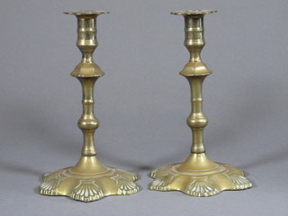 A pair of 18th Century style brass candlesticks with petal bases  8"