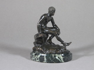 A 19th Century bronze figure of Mercury, raised on an oval  green marble base 5"