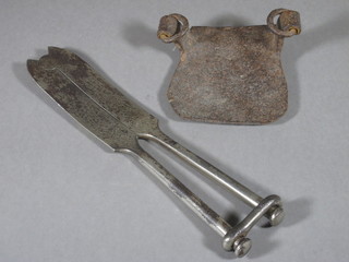 A pair of steel cutters by Arnold & Sons London, together with a  an iron sole protector