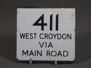 A square enamelled omnibus sign marked 411 West Croydon Via  Main Road 5 1/2"