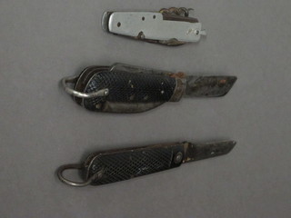 A military issue jack knife and 2 other pocket knives