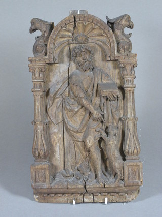 A 17th/18th Century carved oak arch shaped panel depicting a  Saint with dog 13" x 7"  ILLUSTRATED