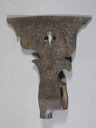 A decorative Eastern metal axe head 7"